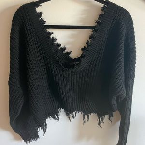Black off the shoulder, flowy and cropped sweater